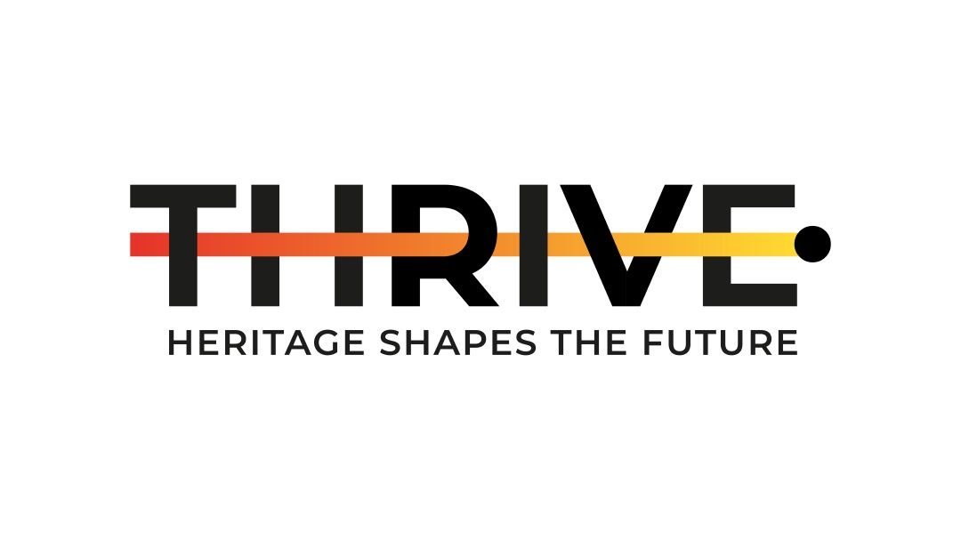 Thrive logo, black text with an orange line throughout it, under it its written heritage shapes the future